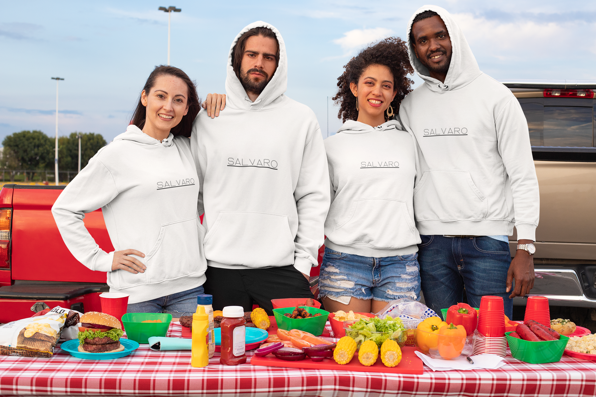 mockup-of-a-group-of-friends-with-hoodies-at-a-tailgate-party-29905.png